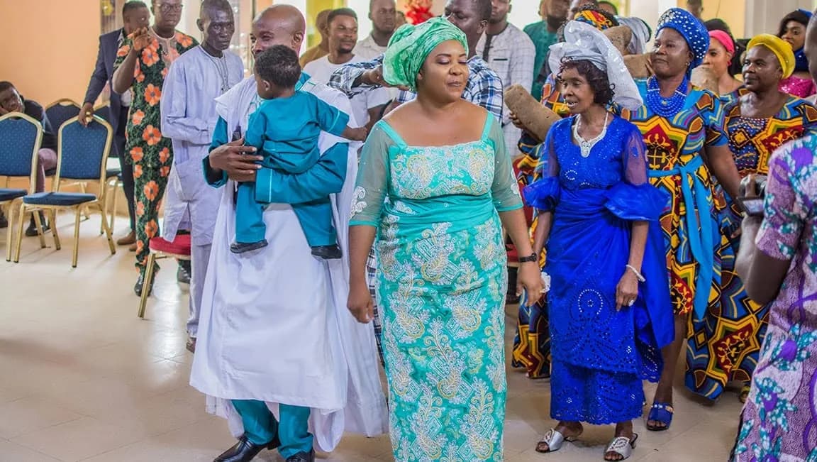 Members of the fellowship gathered together in traditional dress
